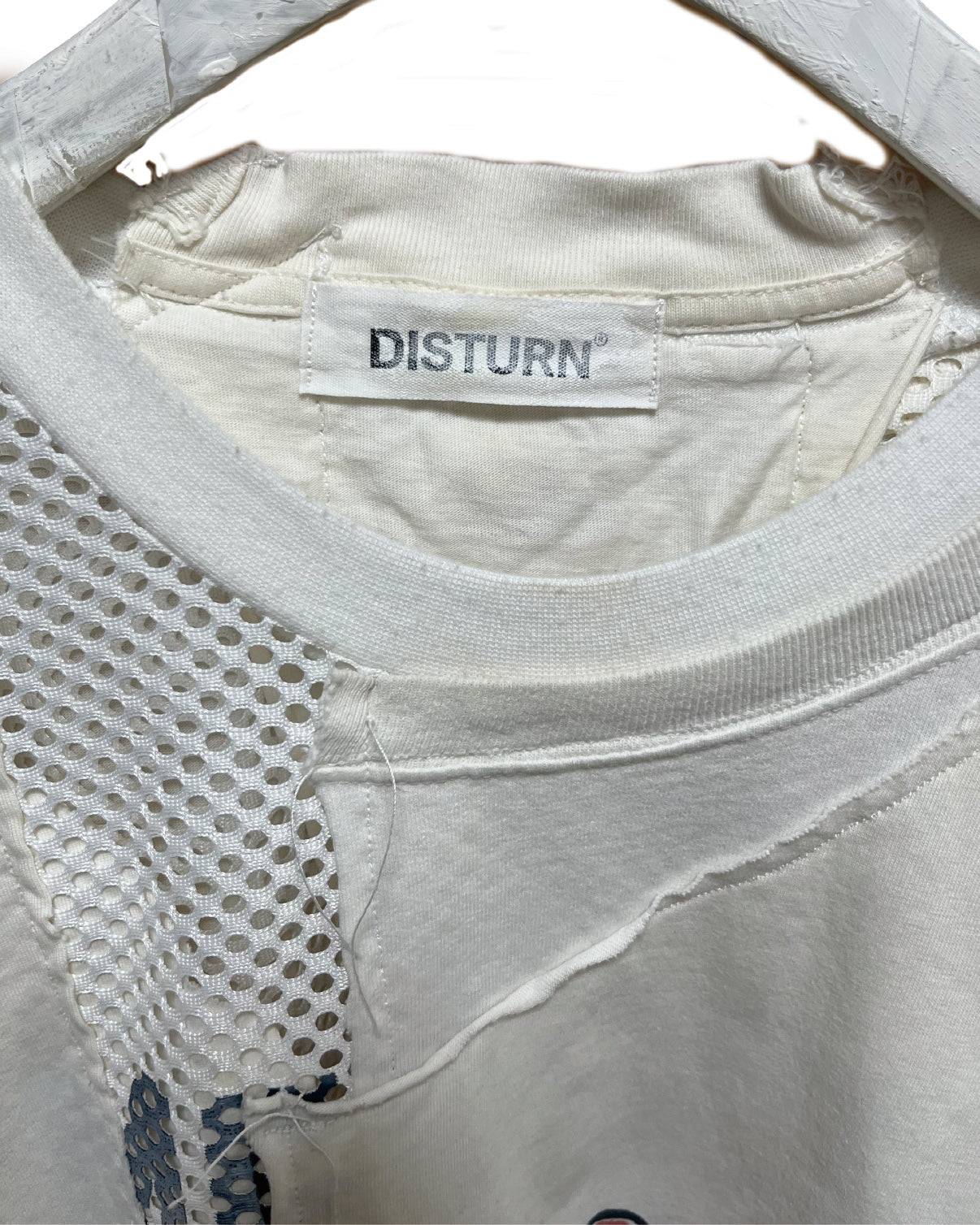 THAT IS+NOT DISTURN. REMAKE MESH COMBI S/S TEE