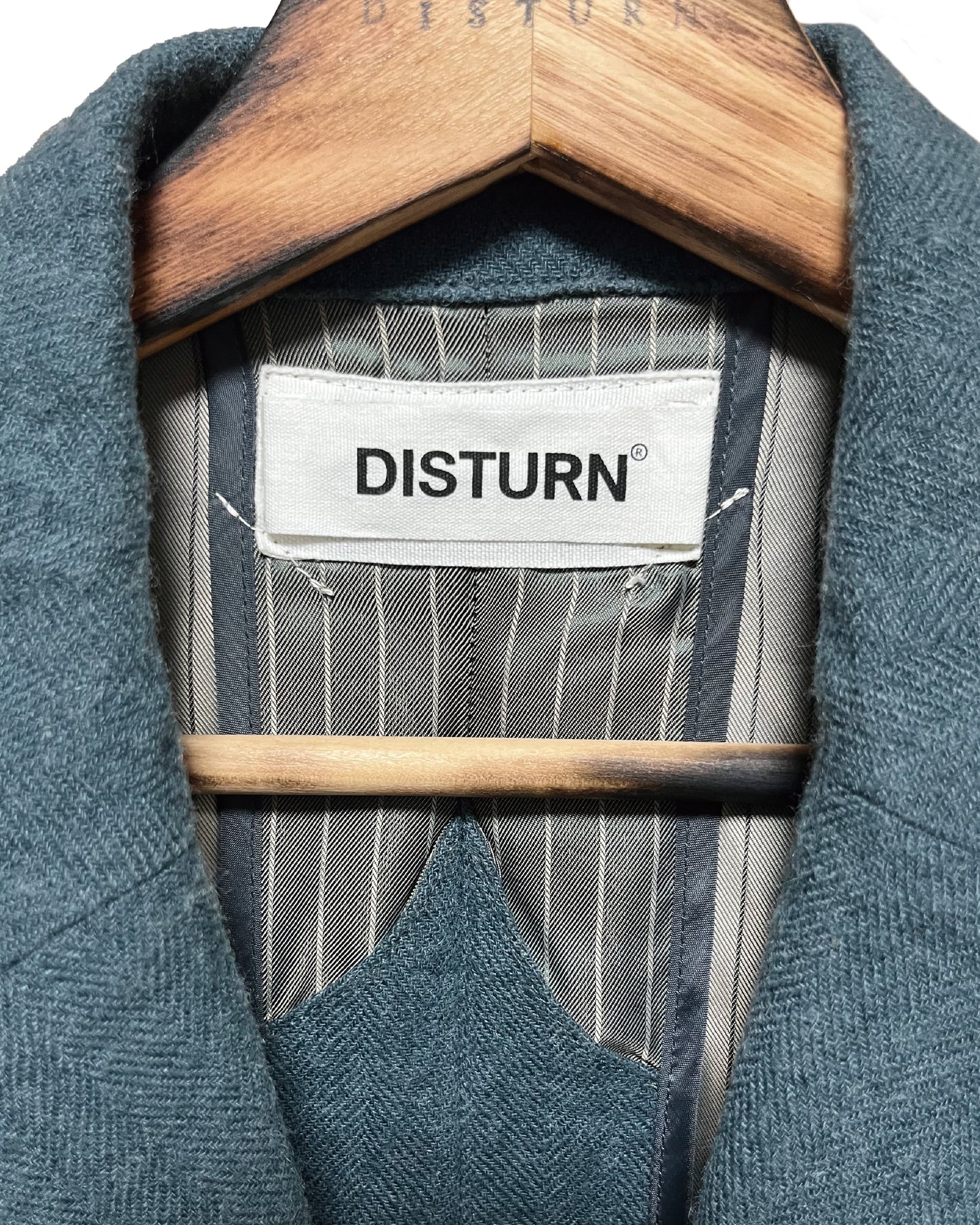 DISTURN The unbuttoned tailored jacket